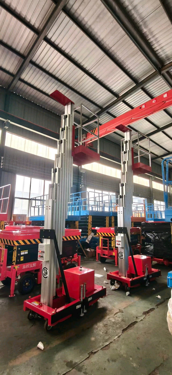 Four aluminum aerial work platforms being prepared for export to the Americas