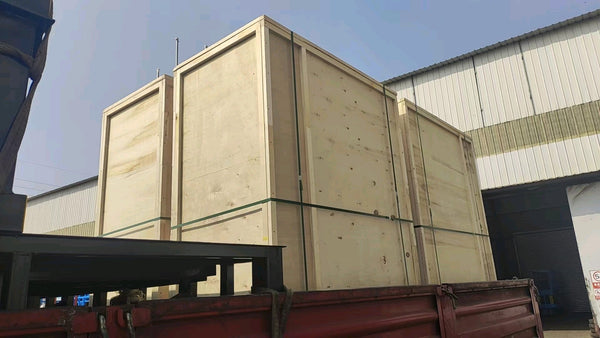 Four aluminum lifts in wooden crates packed and ready for export shipment