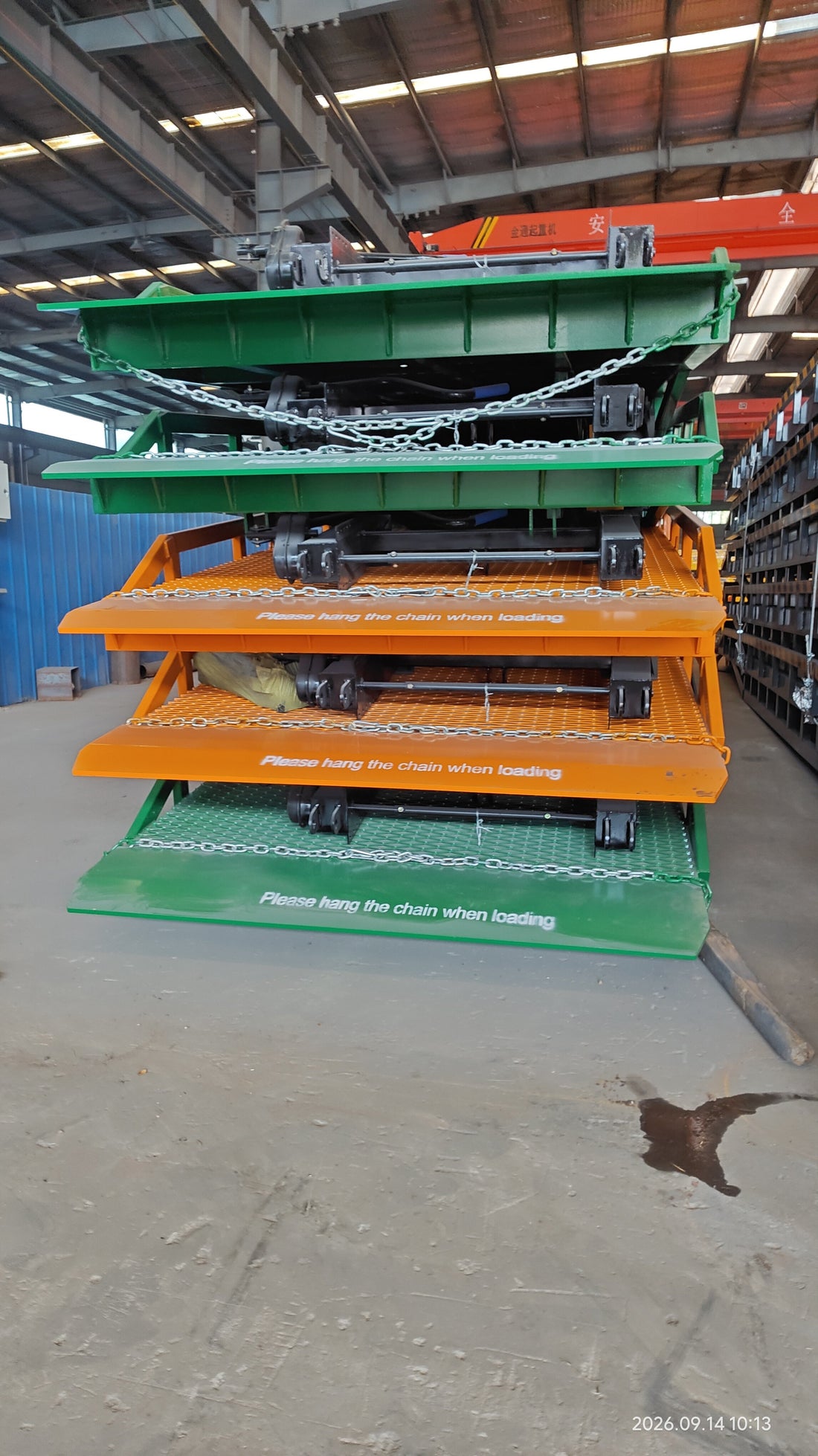 10-ton mobile dock ramps in yellow and green ready for shipment to Europe