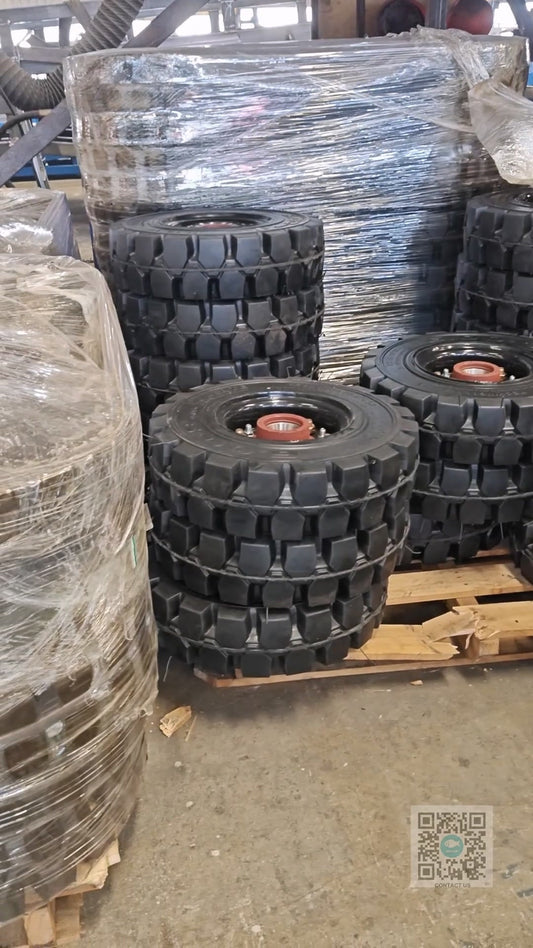600mm solid tires on a Beacon Industries mobile dock ramp, designed for heavy-duty loading support
