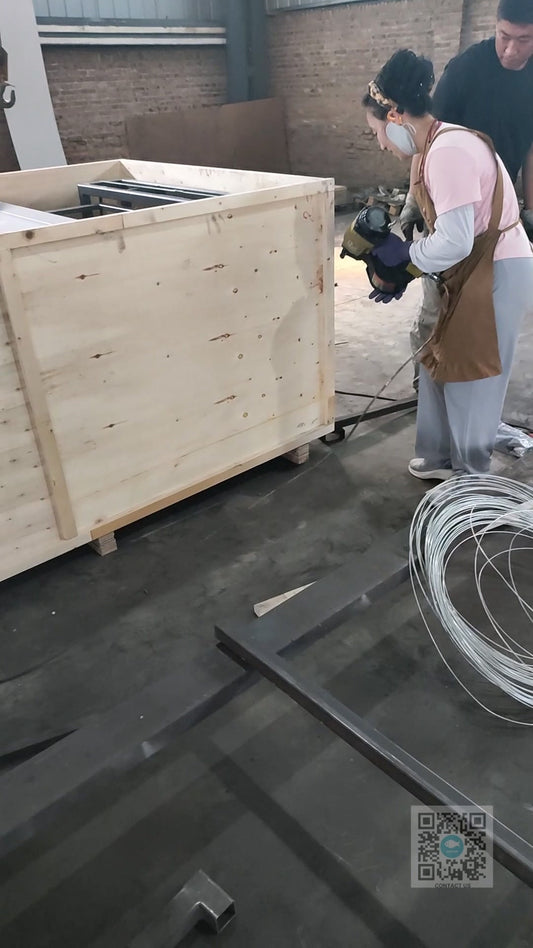 BEACON two-floor home lift being packed in a reinforced wooden crate for shipment